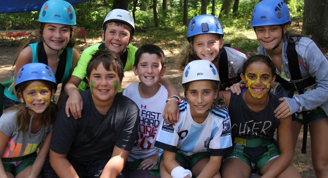 campers in rock climbing gear