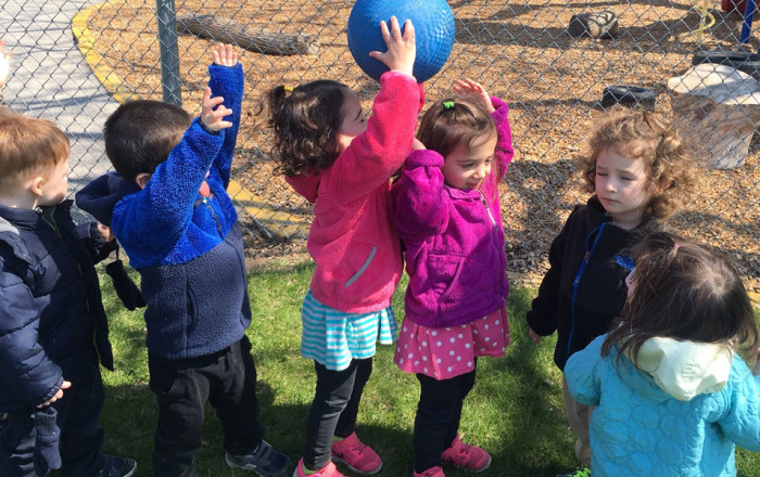 preschoolers playing games outside