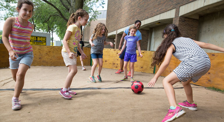 girl campers playing gaga