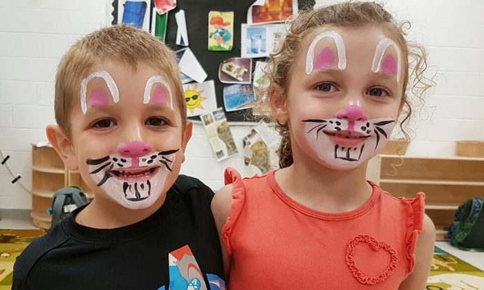 boy and girl with rabbit face paint