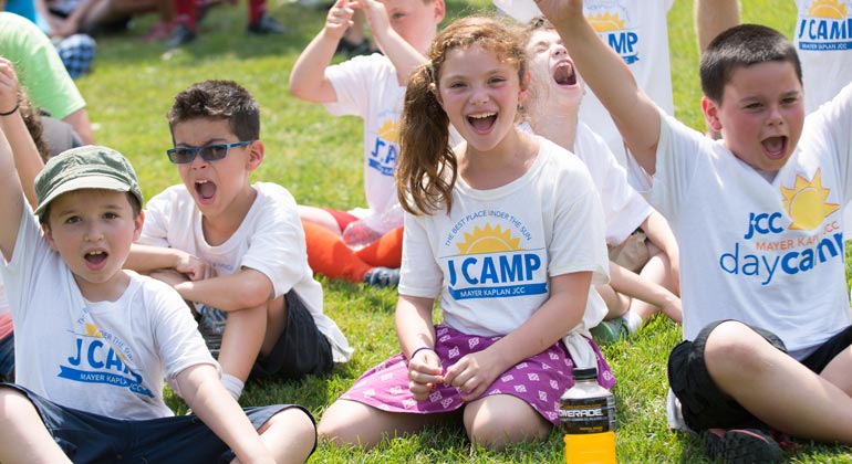 jcamp campers smiling and cheering