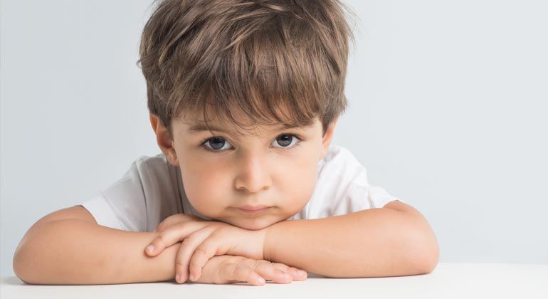 little boy posing for picture