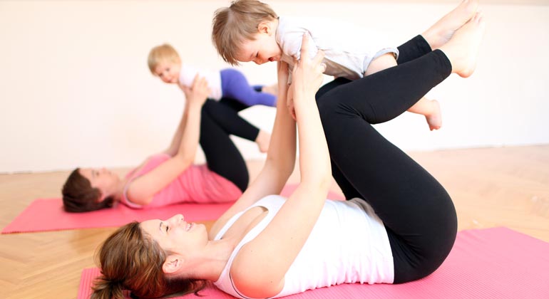 moms and babies playing