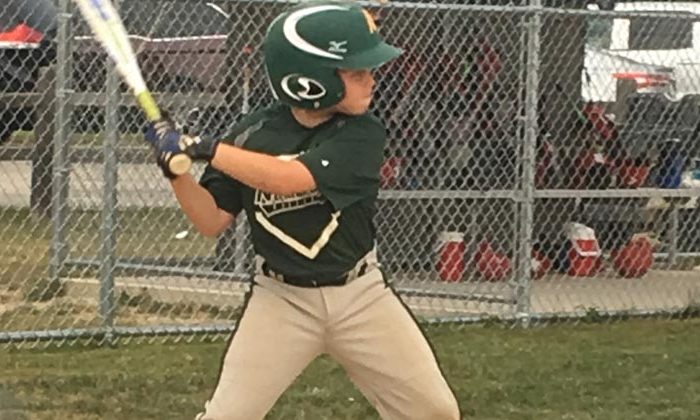 boy playing baseball