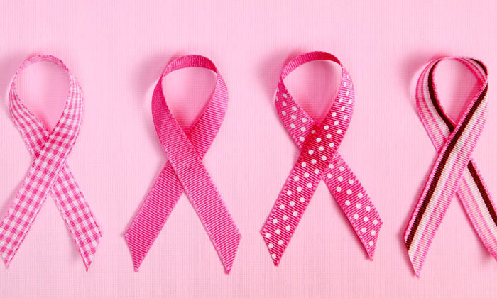 breast cancer awareness pink ribbons on pink background