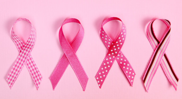 breast cancer awareness pink ribbons on pink background