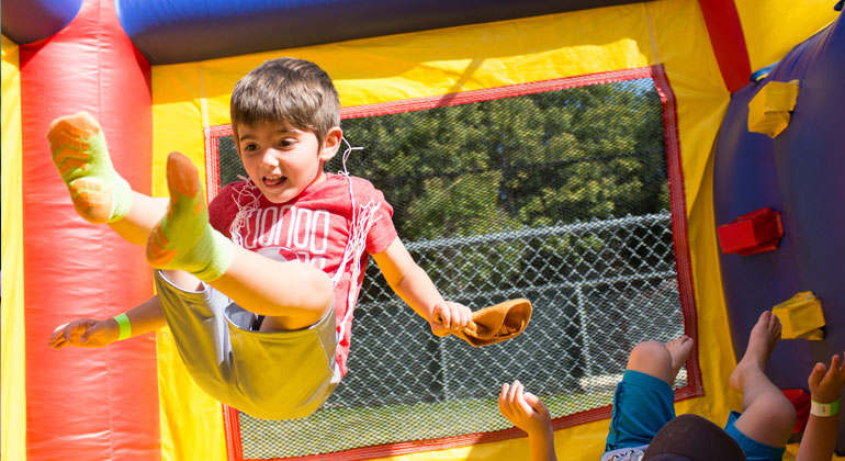 kids playing in bouncy house