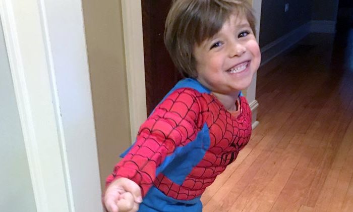 little boy in spider man costume