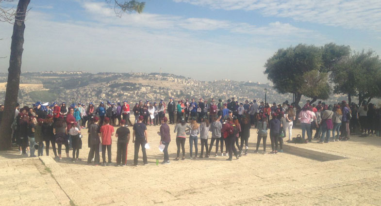 large group of travelers in israel