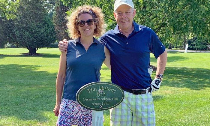 addie goodman and her husband at golf course