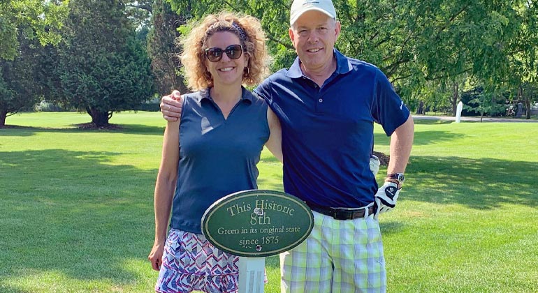 addie goodman and her husband at golf course