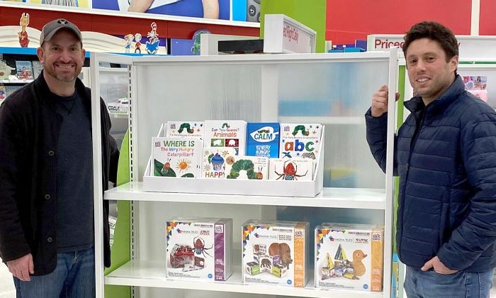 dads at Target next to display of children's books