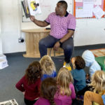 teacher reading to students