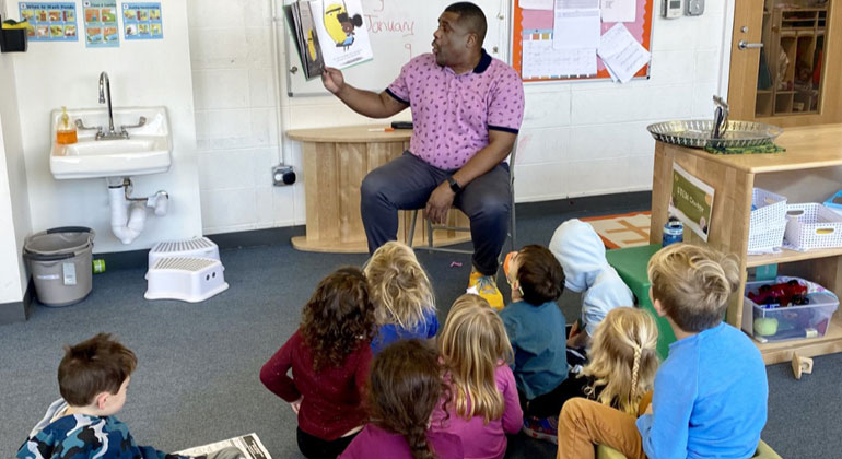 teacher reading to students