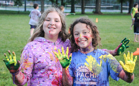 apachi kids with paint on hands