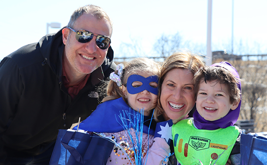 family celebrating purim