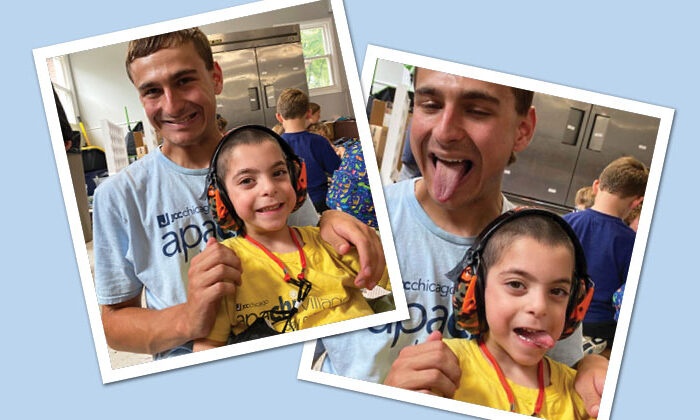 special needs apachi camper posing for pictures with counselor