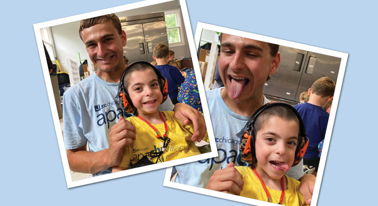 special needs apachi camper posing for pictures with counselor