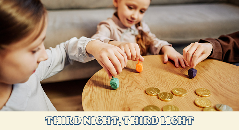 kids playing with dreidels