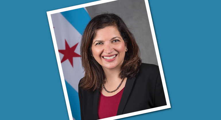 photo of Rachel Arfa in front of Chicago flag on blue background
