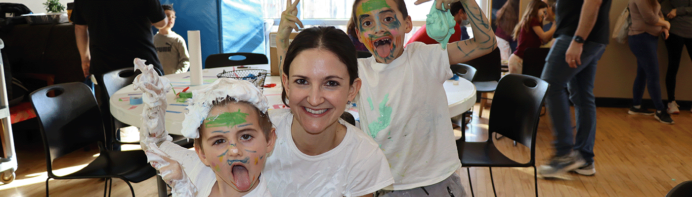 mother and kids at messy day